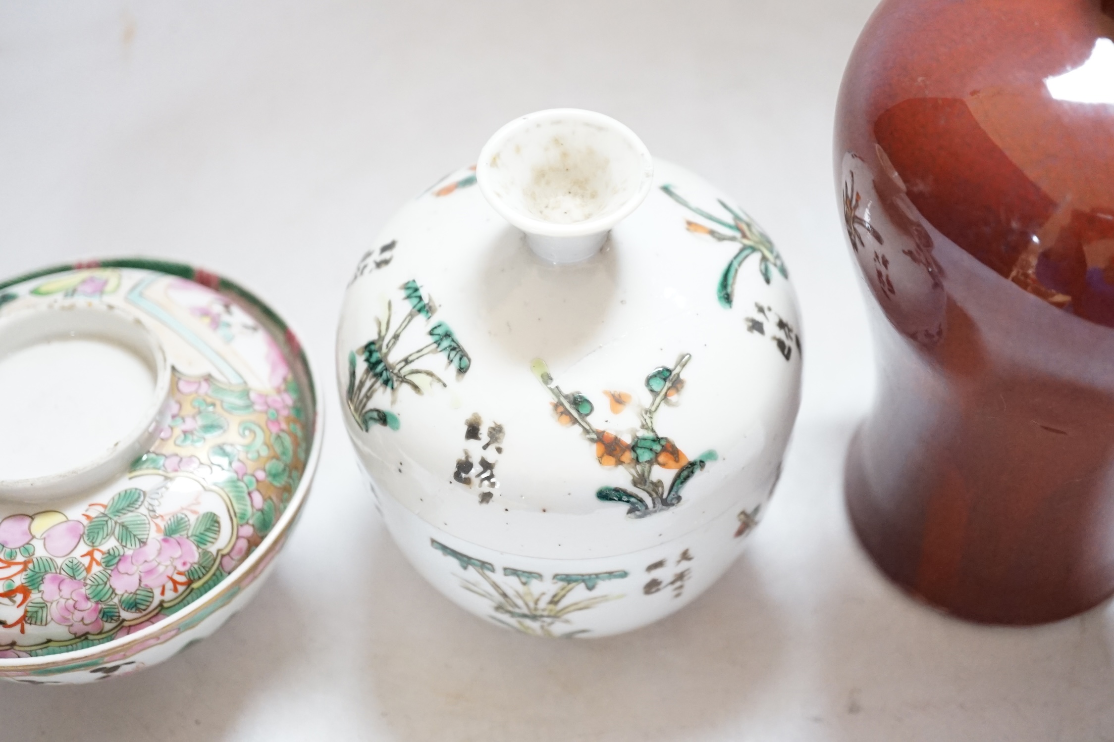 A Chinese sang de boeuf vase, 17.5cm high, and two others